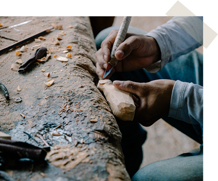 Craftsman carving wood